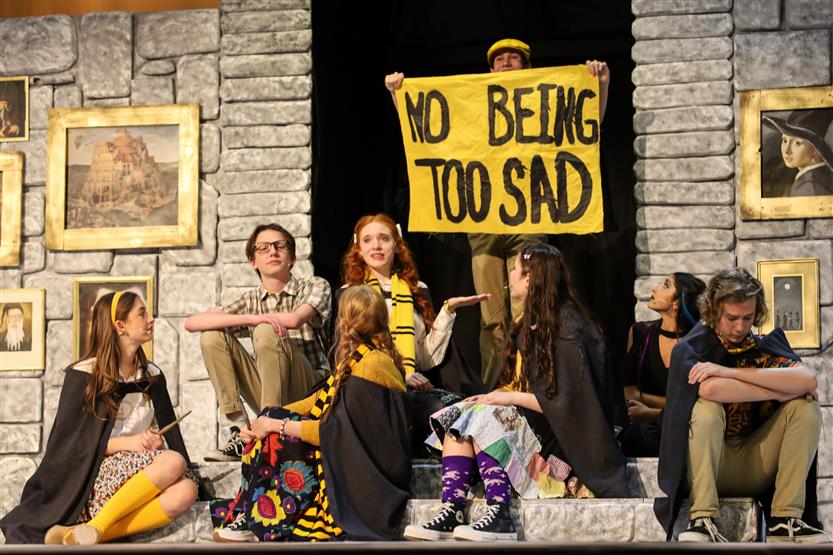 Students perform onstage